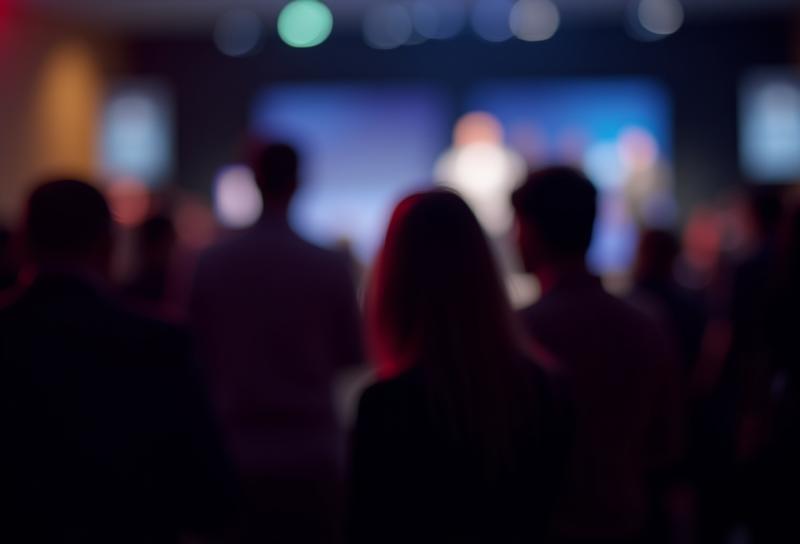 Example of dynamic event photography capturing a conference moment